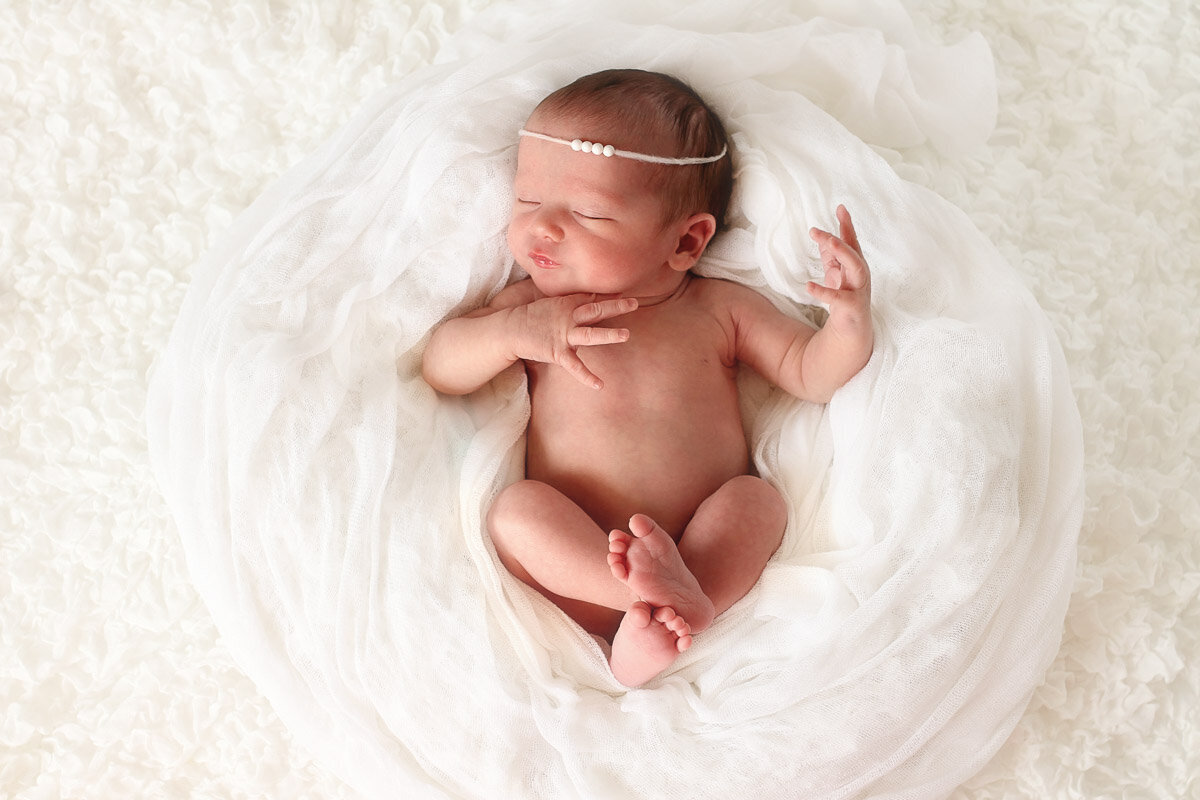 Sleeping newborn at home photo session in Calgary Alberta|