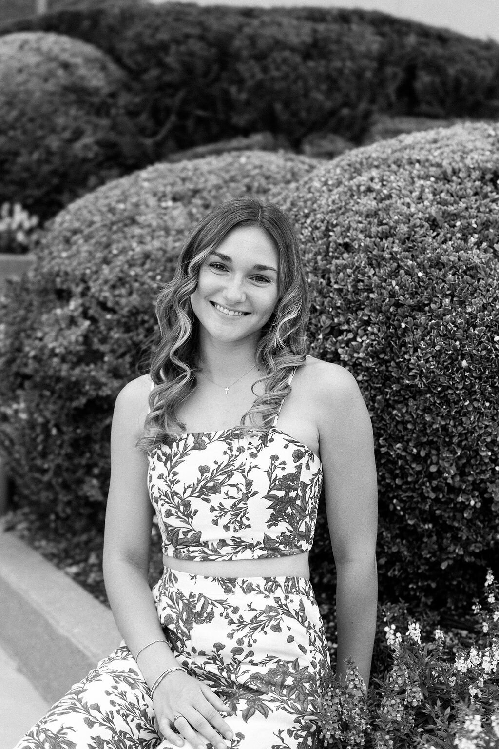 girl poses for senior photos