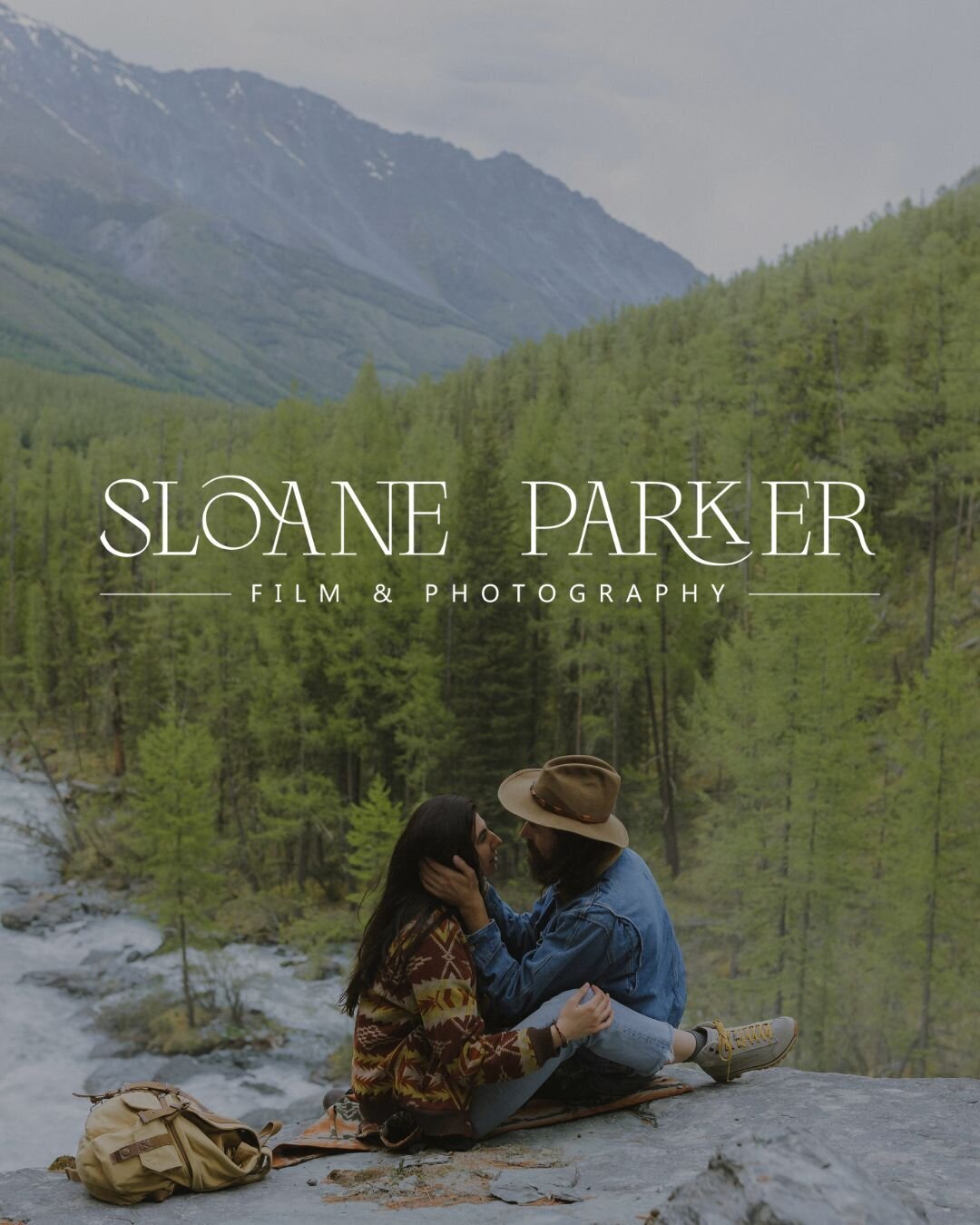 Sloane Parker Film & Photography Logo | Couple sitting together on a rock in front of forest and mountains | Mad Impact Design | Mini Branding