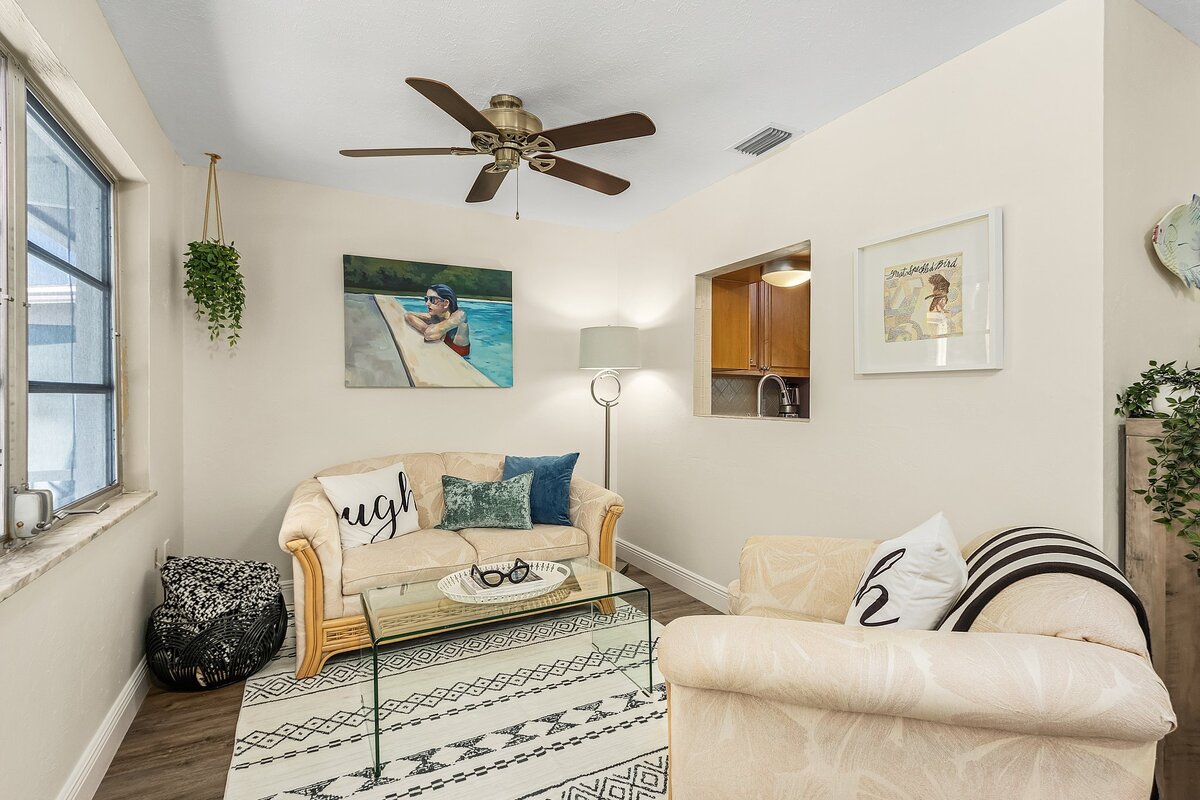 short term rental living room with cream and blue accents