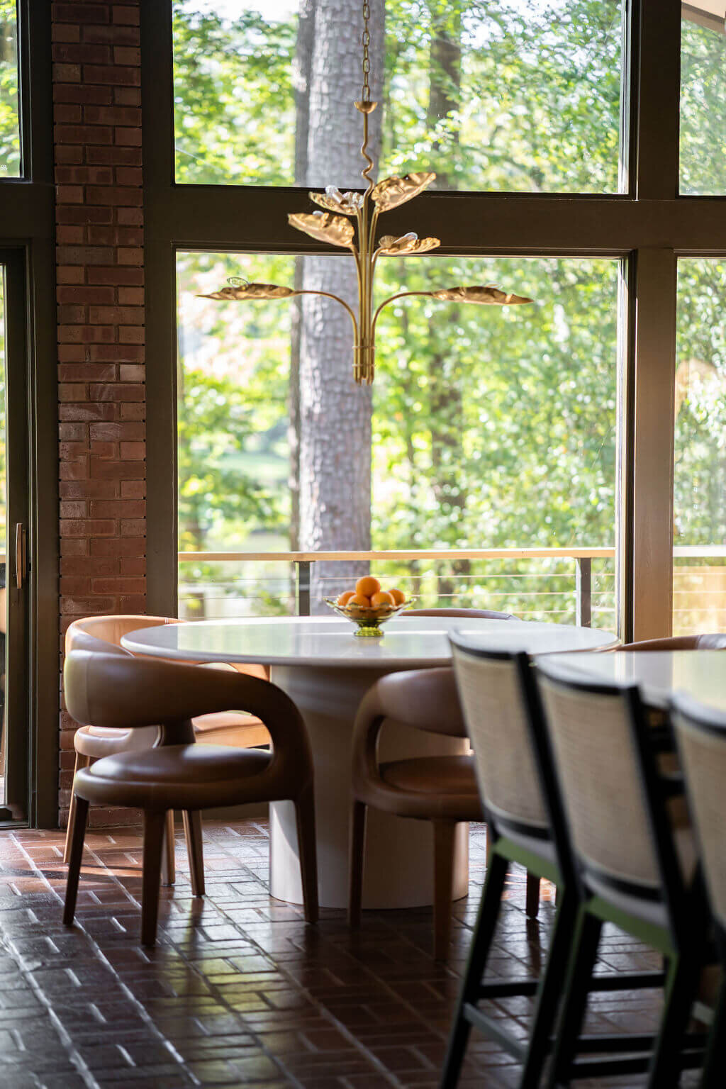 sweet southern home mid mod round table with leather chairs