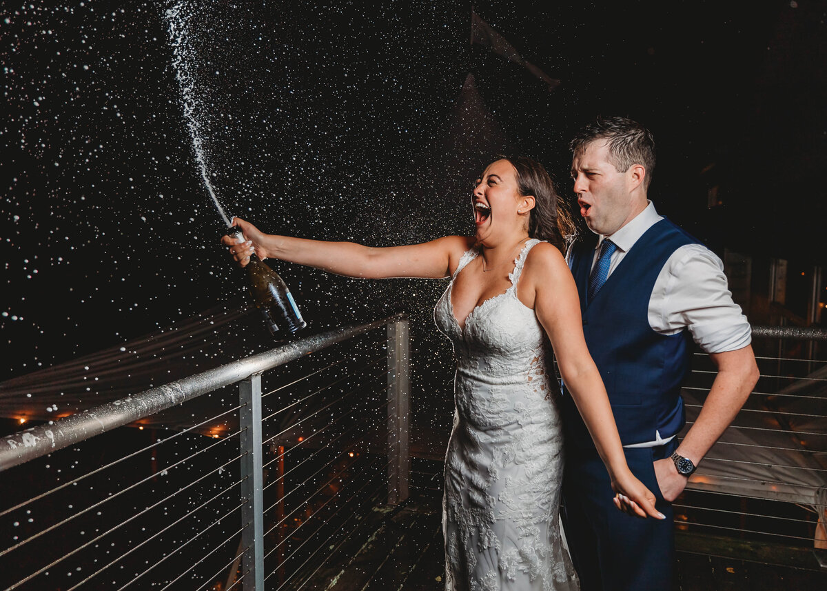 wedding-couple-champagne-celebrate-saltwater-vineyard-stonington-ct