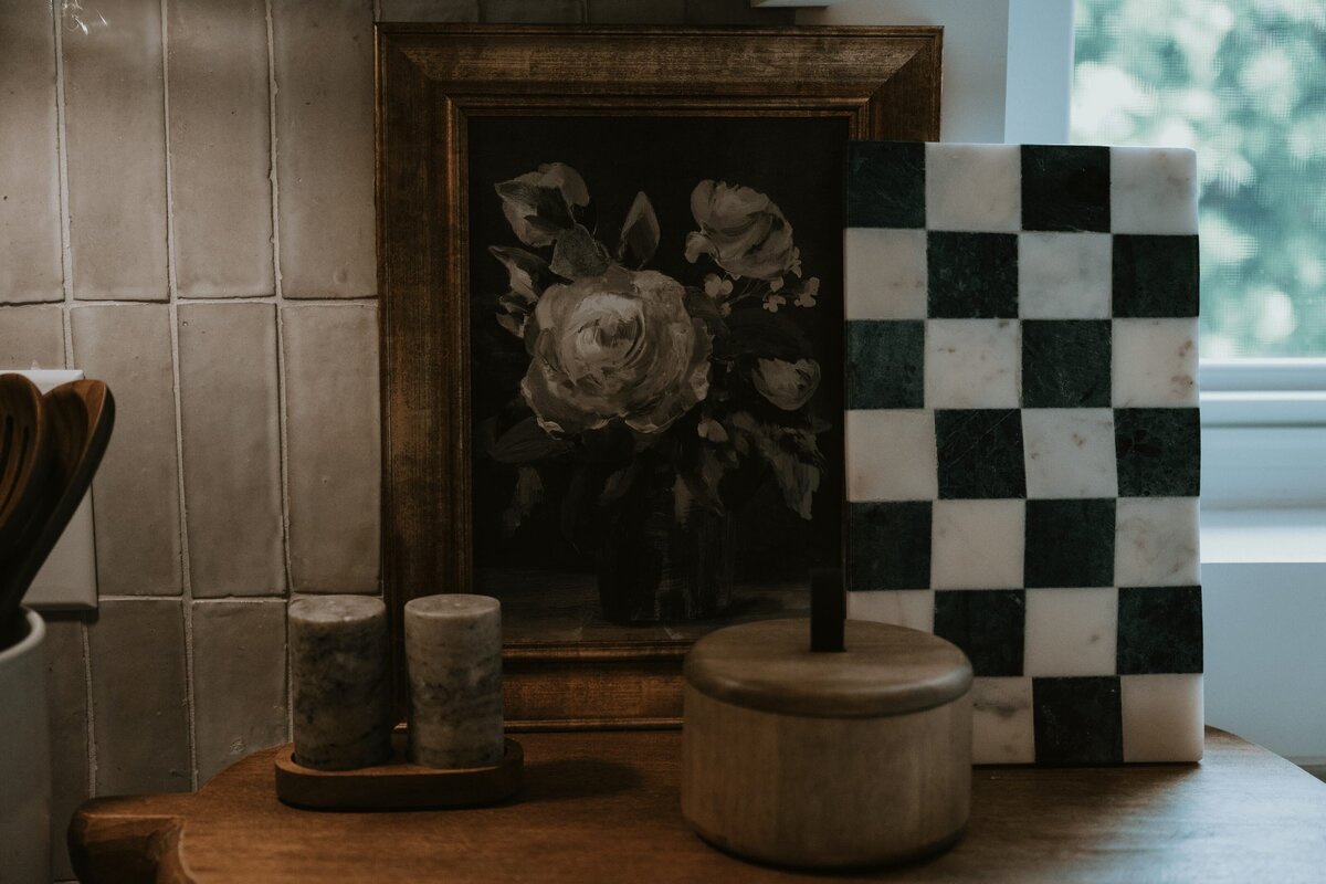 dewine design orlando interior design vintage cove trail kitchen counter with framed painting