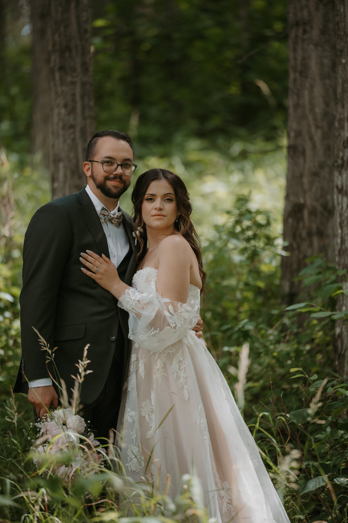 bride and groom posing on edmonton wedding day