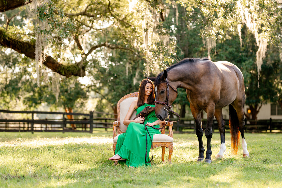 Horse photographer near Tallahassee, FL takes photos of girl with her horse and puppy under gorgeous Oak trees.