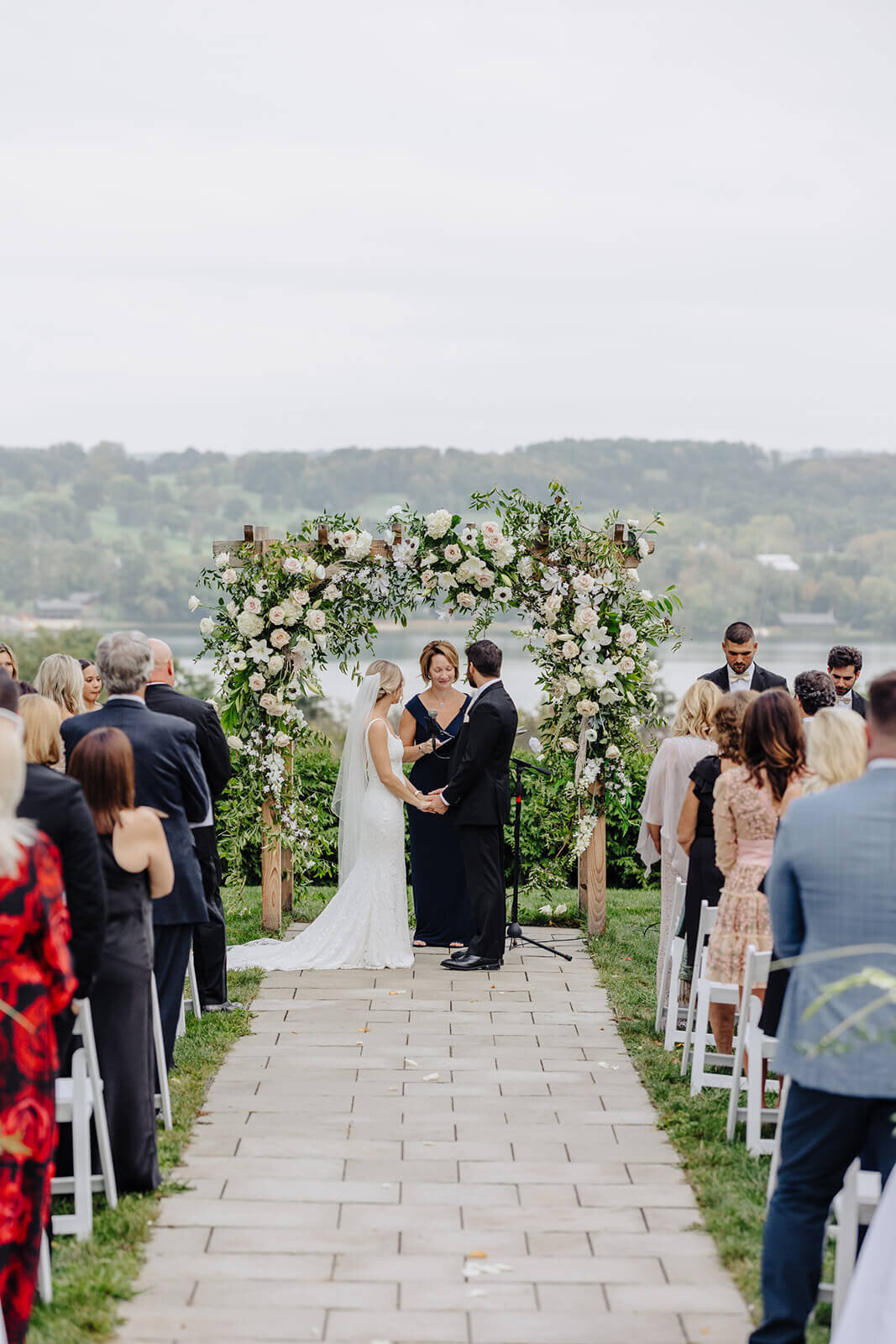 Wedding ceremony on edge of the lake at Finger Lakes Wedding