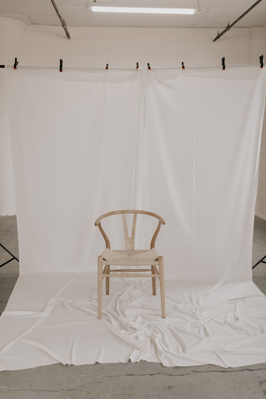 Wicker chair at modern photo studio in St Paul, Minnesota