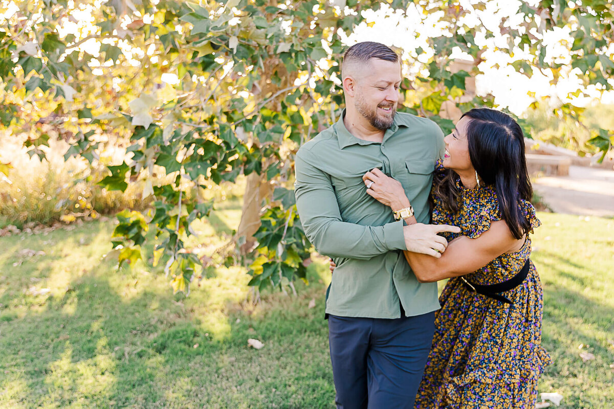 Couple laughing and tickling