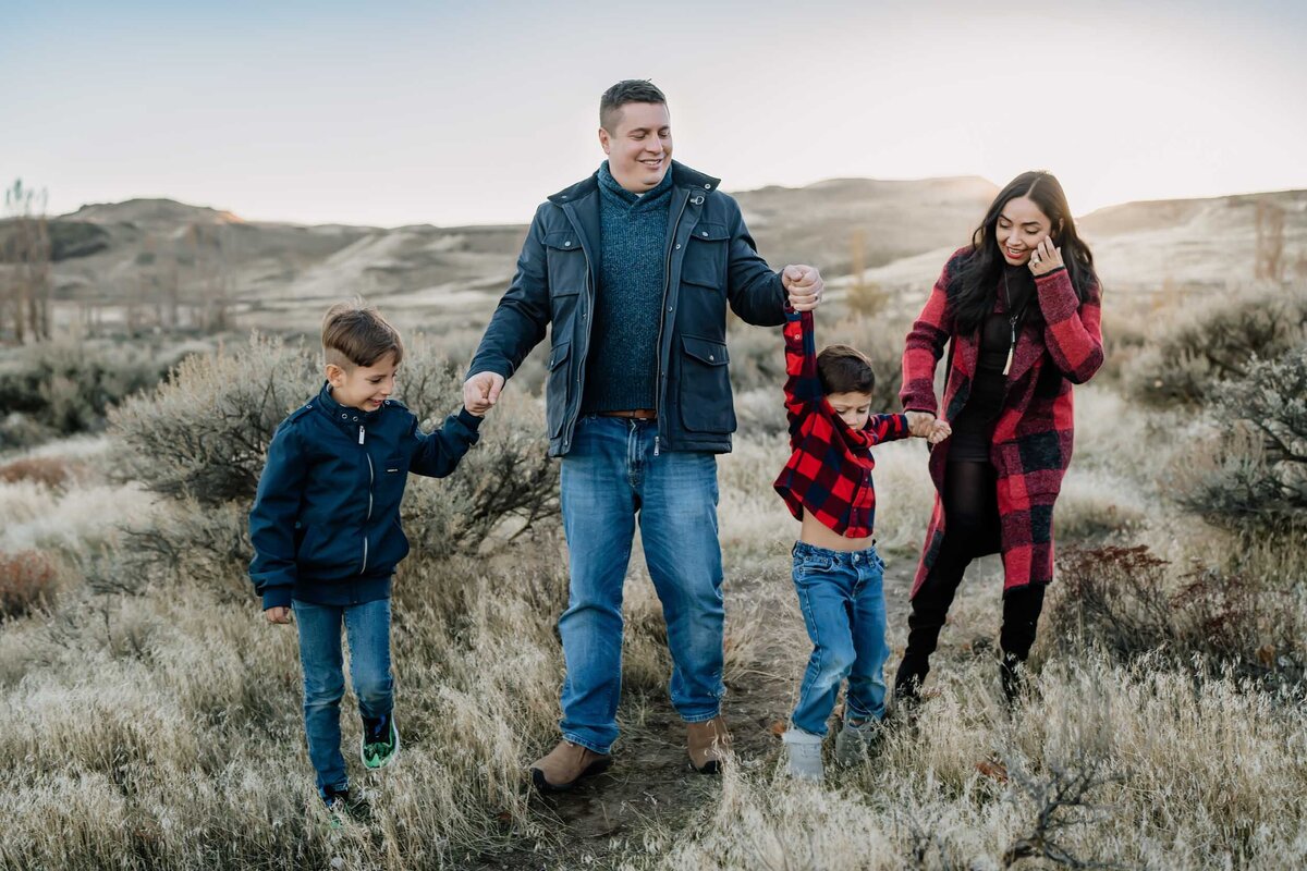 Natural lifestyle photo of a family walking together, capturing an authentic, candid moment filled with love and movement.