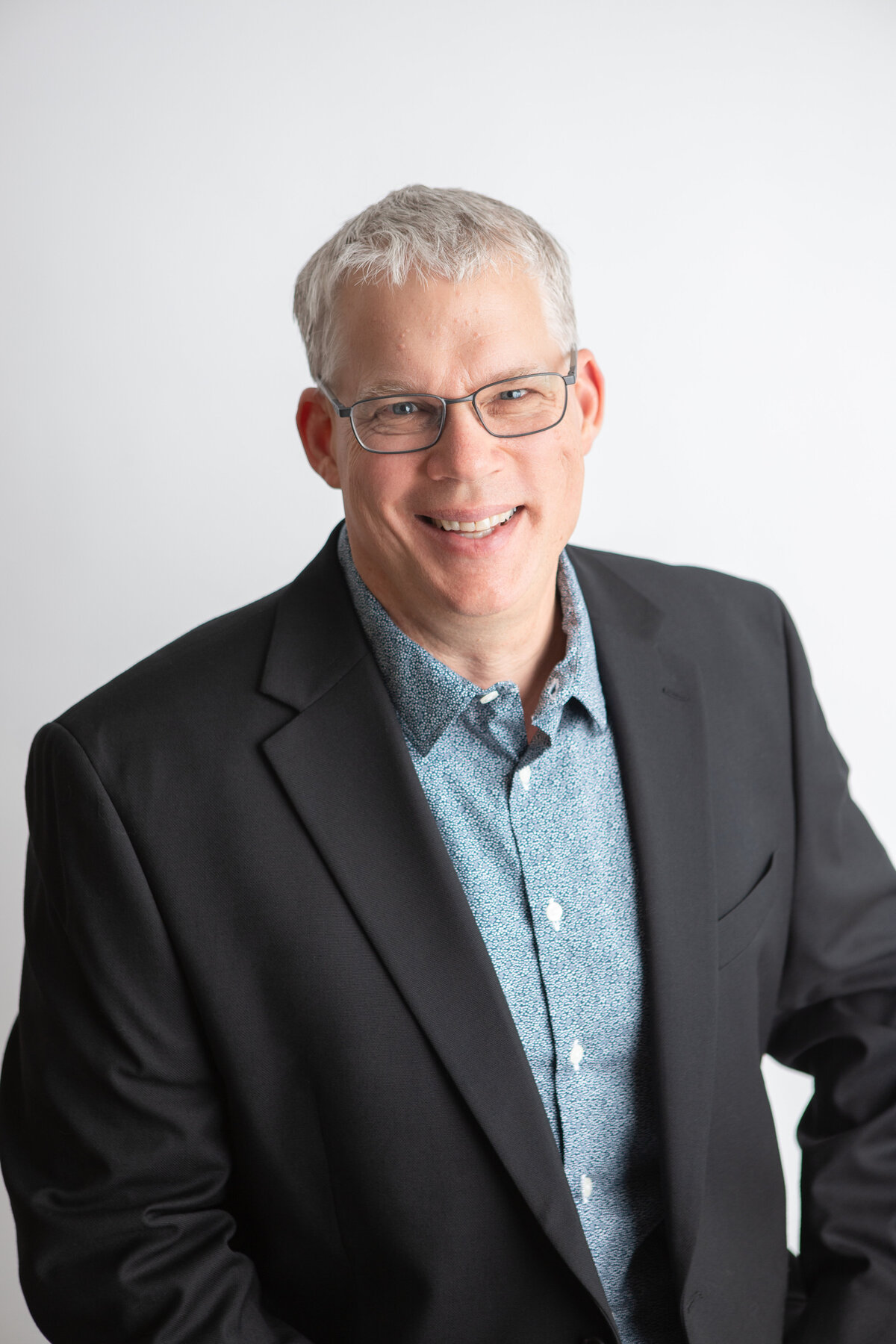 Edmonton studio headshots with a plain white backdrop