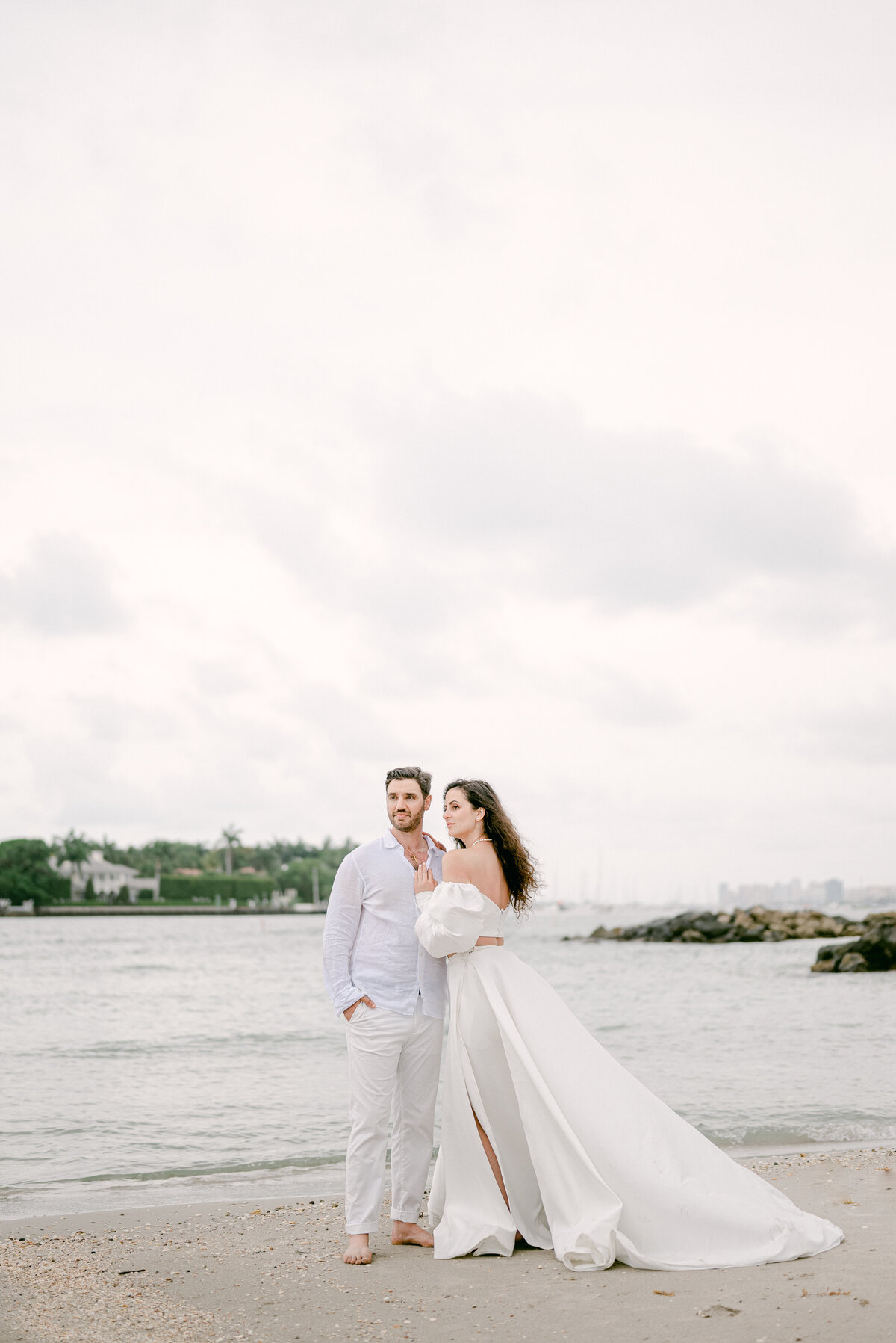 West Palm Beach session with bride and groom on the beach looking at the same direction
