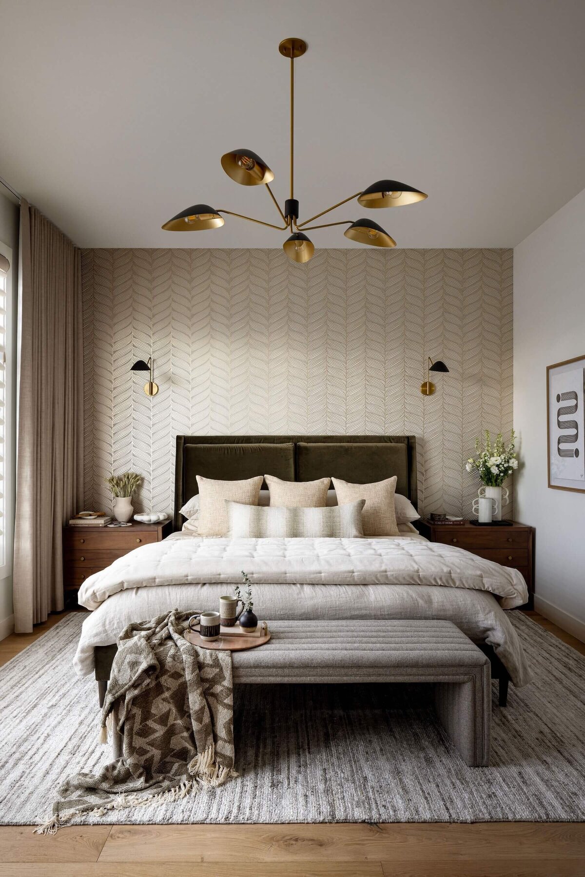 Tranquil bedroom retreat with olive green upholstered headboard with linen bedding, 