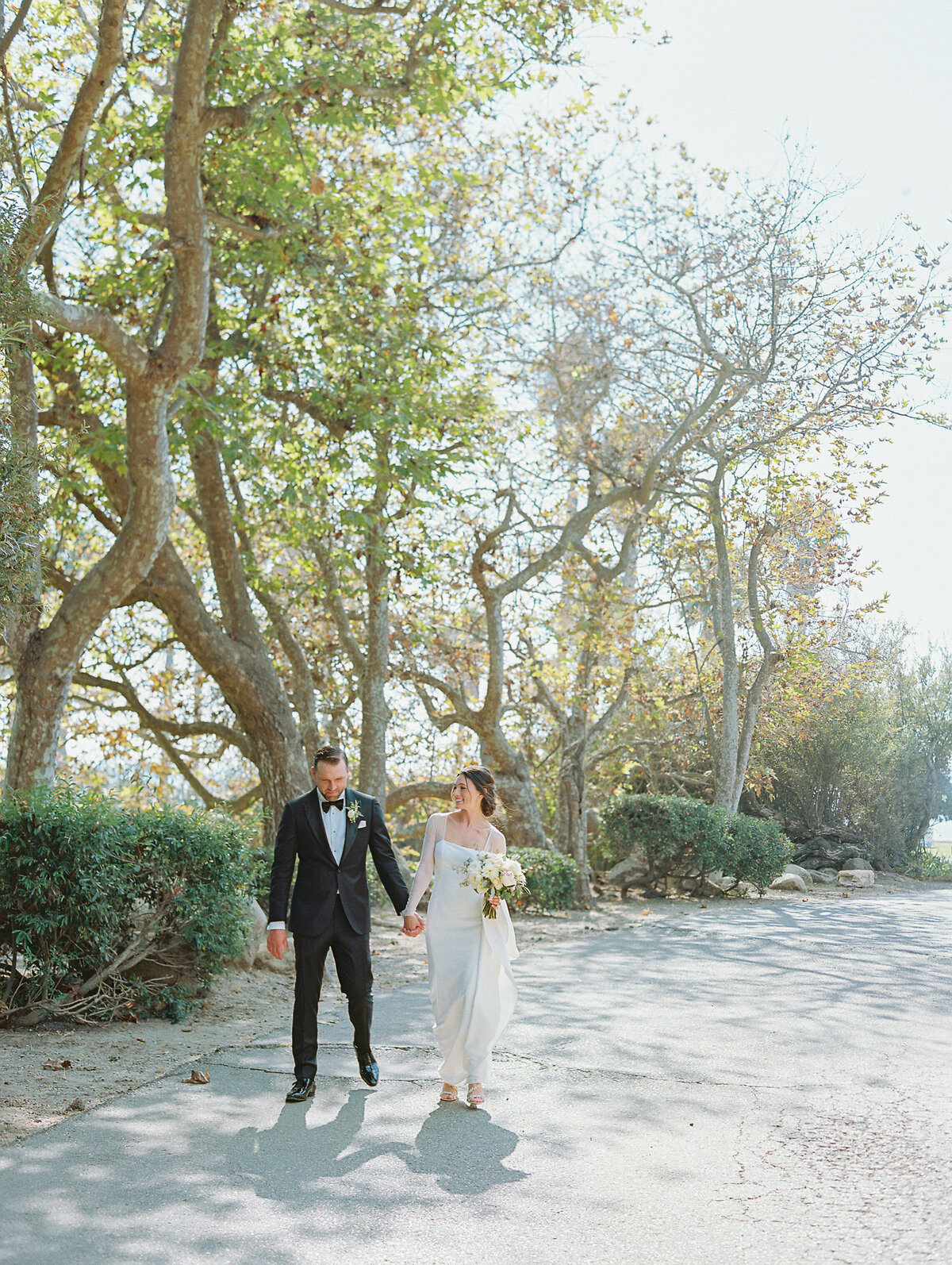 couple walking at rancho dos pueblos