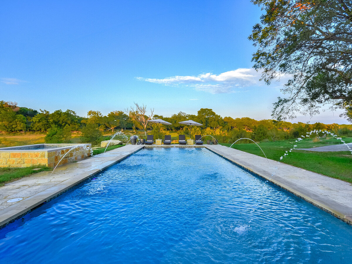 Large outdoor pool with blue skys