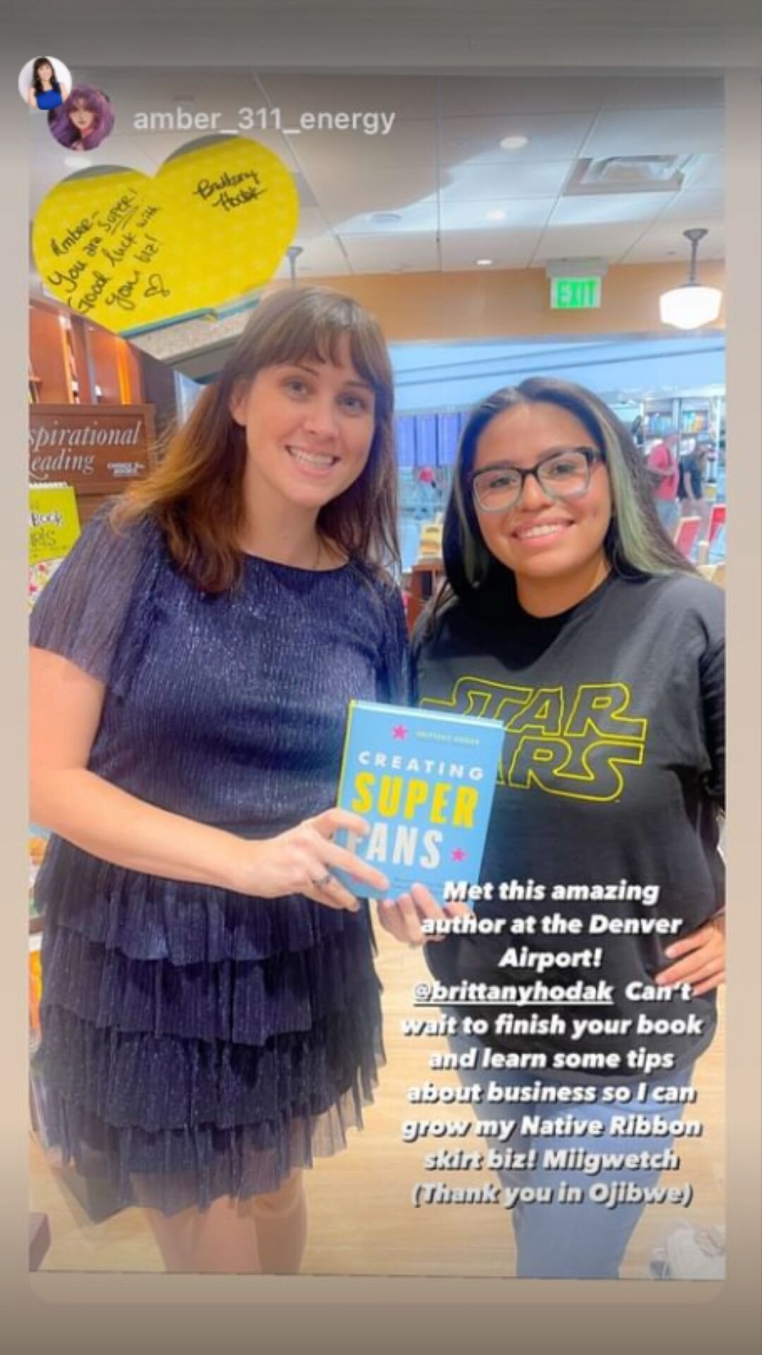 Brittany Hodak poses with a reader who says she loves her book, Creating Superfans.