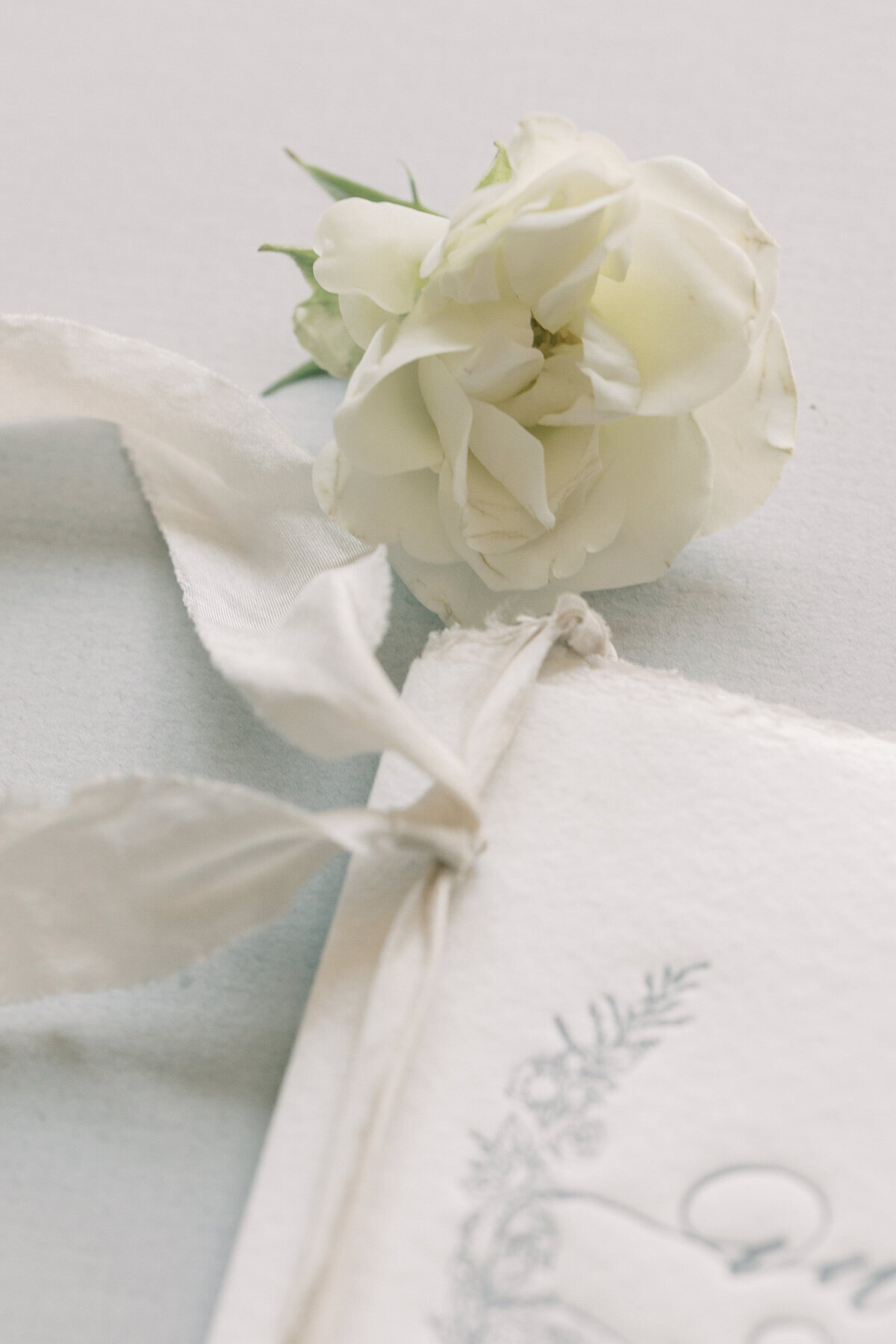 silk ribbon on wedding vow book
