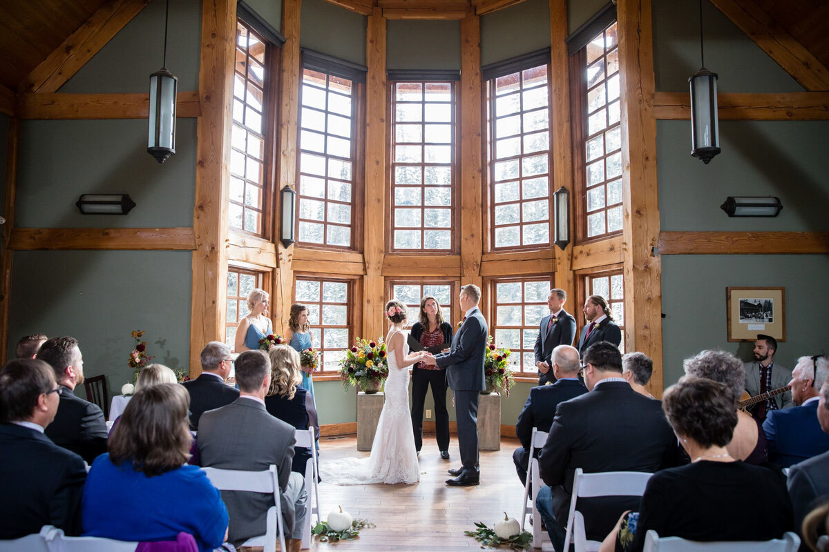 Wedding ceremony at Cilantro, Emerald Lake Lodge, rustic and classic Field, British Columbia wedding venue, featured on the Brontë Bride Vendor Guide.
