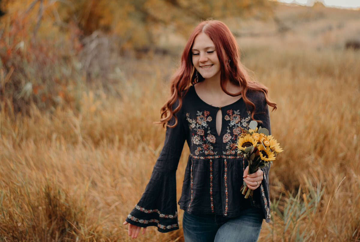 Senior Girl holding flowers in Idaho