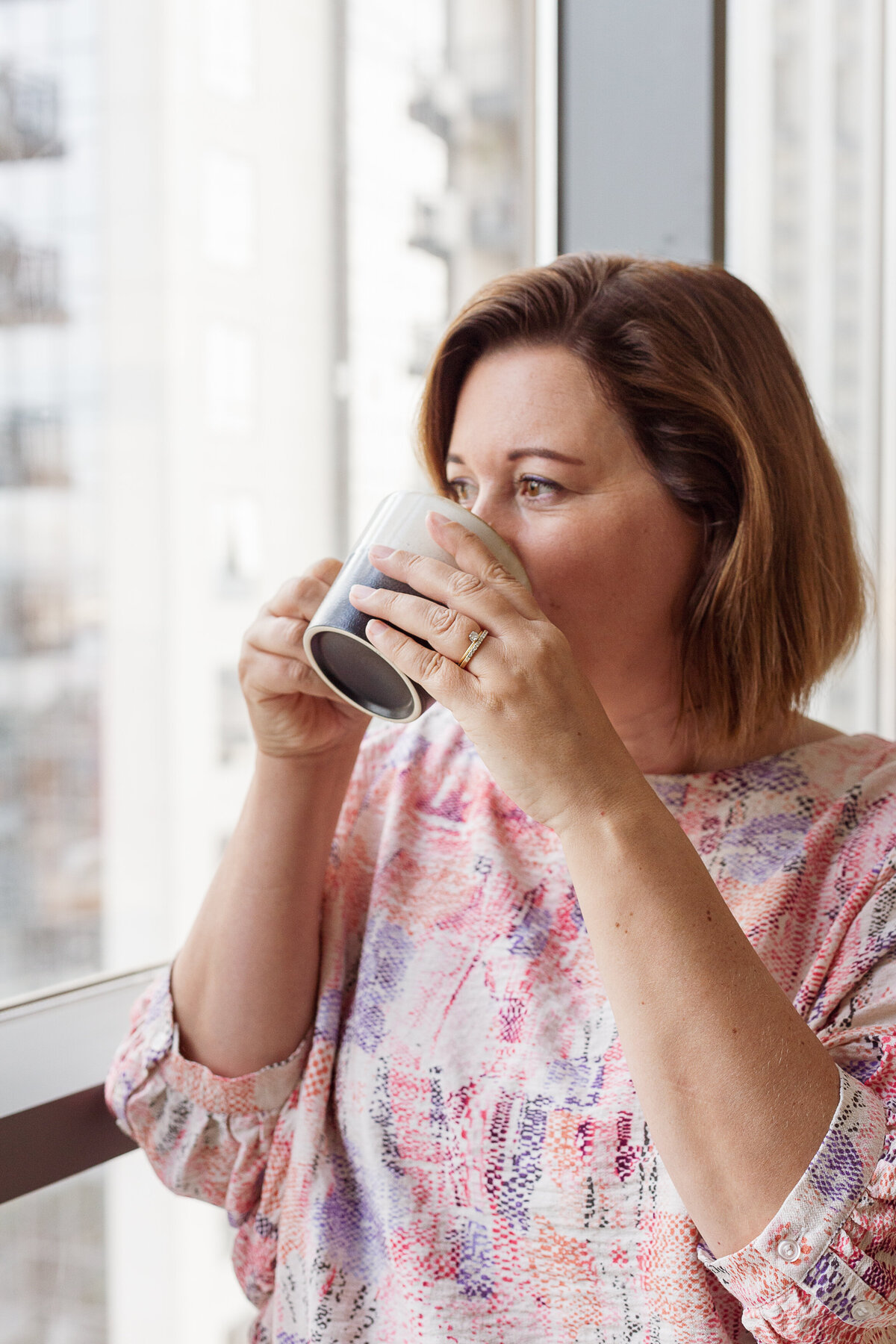 Ilse Vonk in a professional setting, providing strategic guidance as an interim CEO.