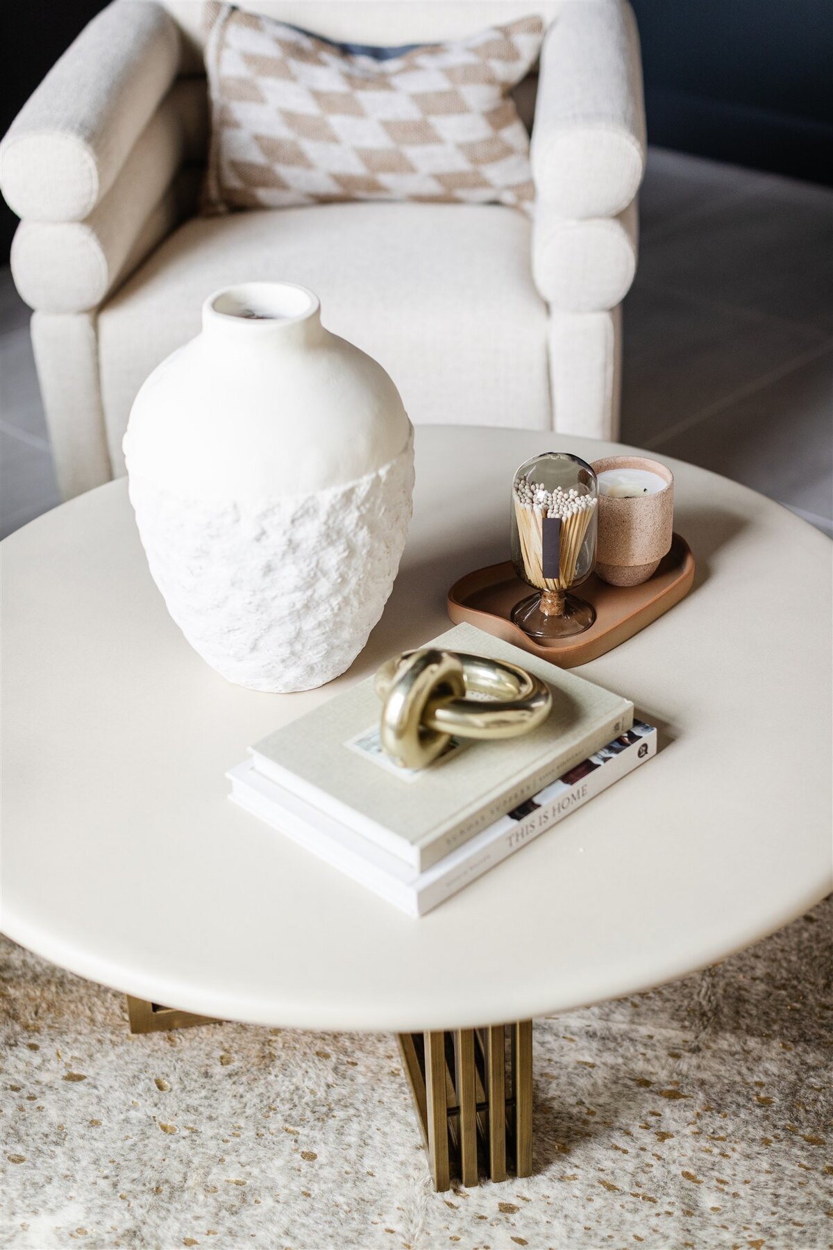White and gold accents on marble side table
