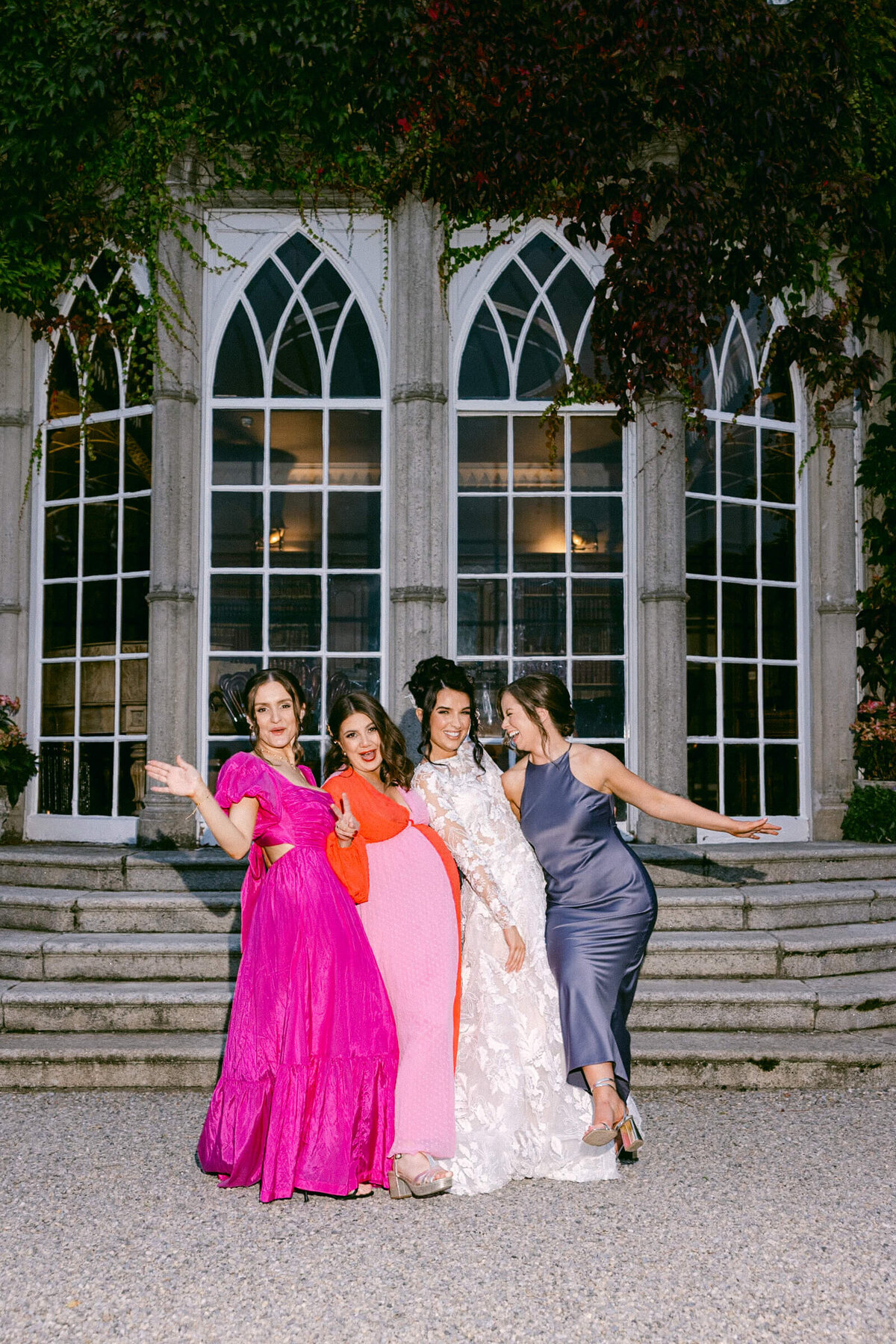 A wedding photo of a bride and her friends celebrating at Luttrellstown Castle