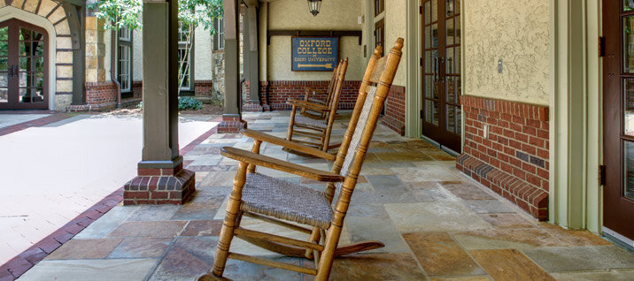 covered porch with rocking chair at the Miller Ward Alumni House Emory University