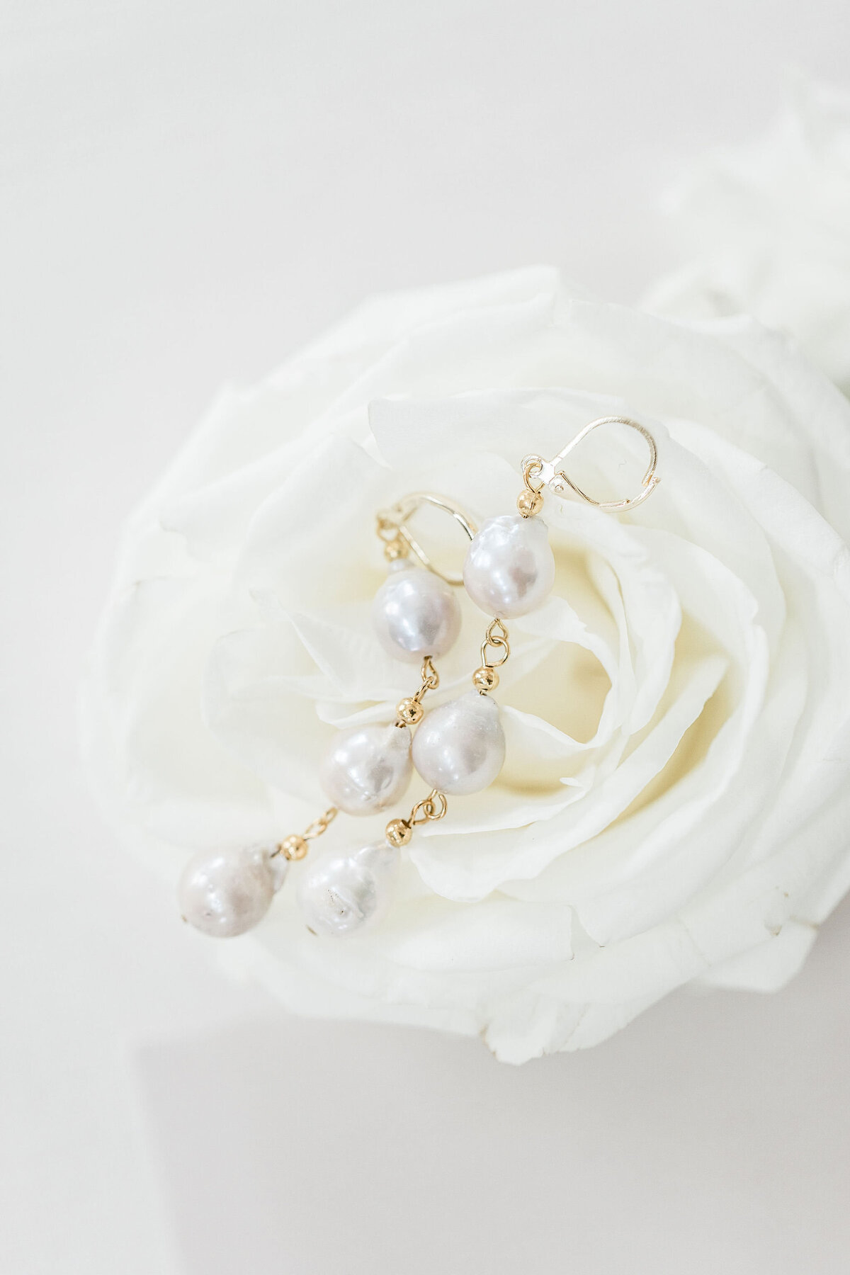 Sometimes the best backdrop for gorgeous earrings is just a prefect rose!