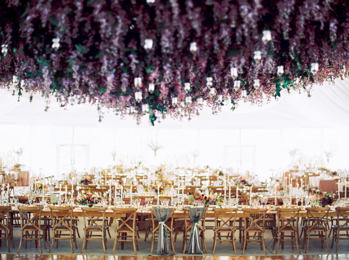 tented-outdoor-wedding-ceiling-installation-flowers