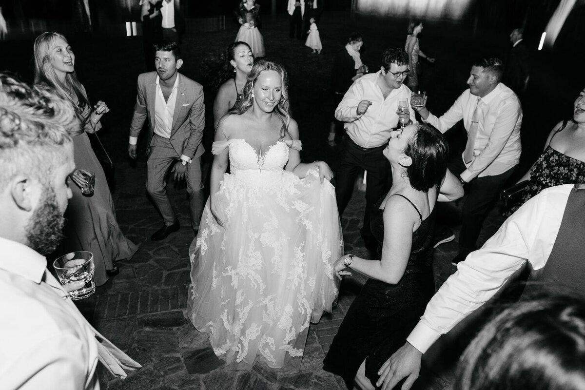 Bride dancing during wedding party.