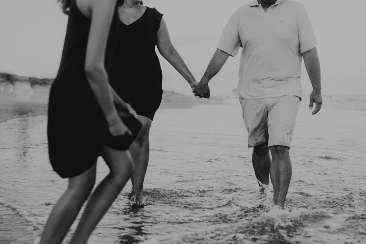 Family dances in the water