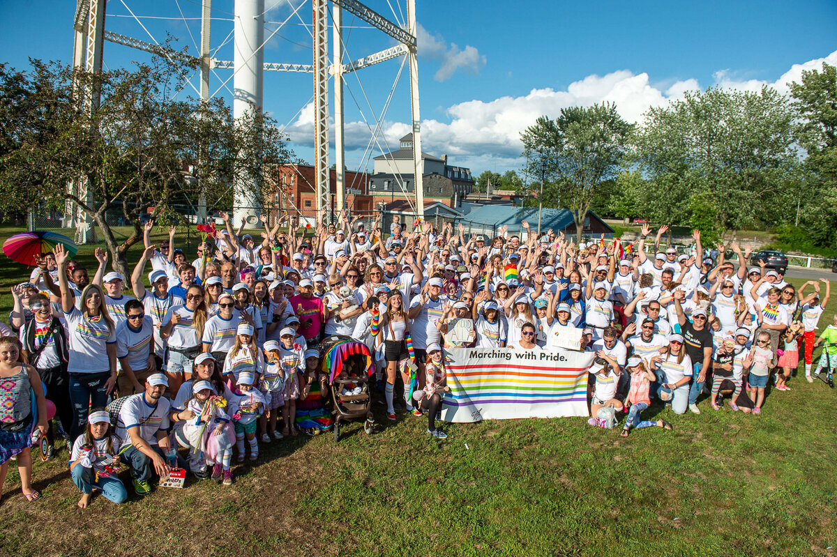 a group photo of all the marchers during the Tweed Canopy Pride Parade.  Captured by Ottawa Event Photographer JEMMAN Photography COMMERCIAL