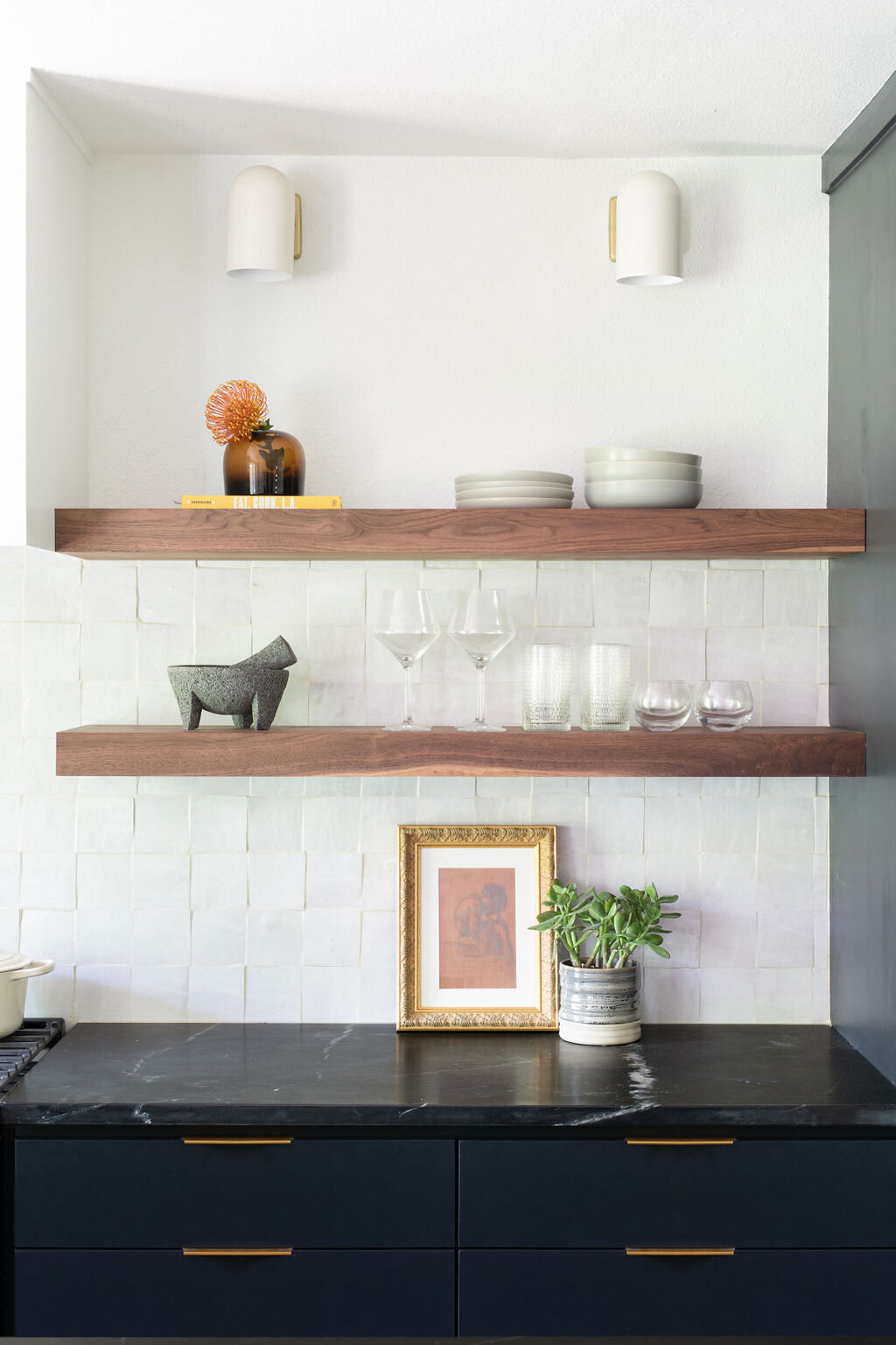 hello-home-austin-black-scandinavian-kitchen-waterfall-peninsula-zelliege-backsplash-black-cabinets-3