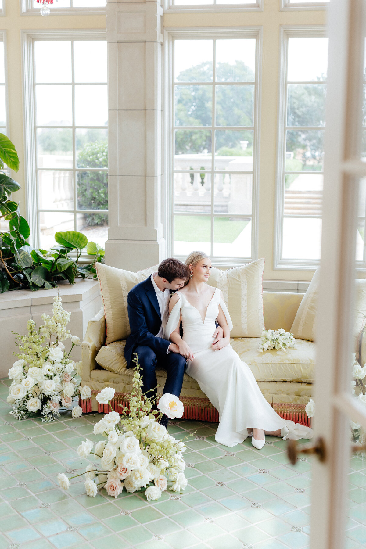 Wedding & Elopement Photogrpahy, bride and groom walking in a large grassy field