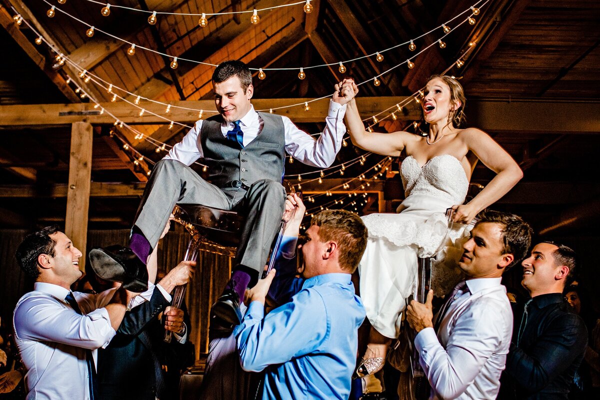 A couple dances the hora at a Bridegeport Art Center wedding.