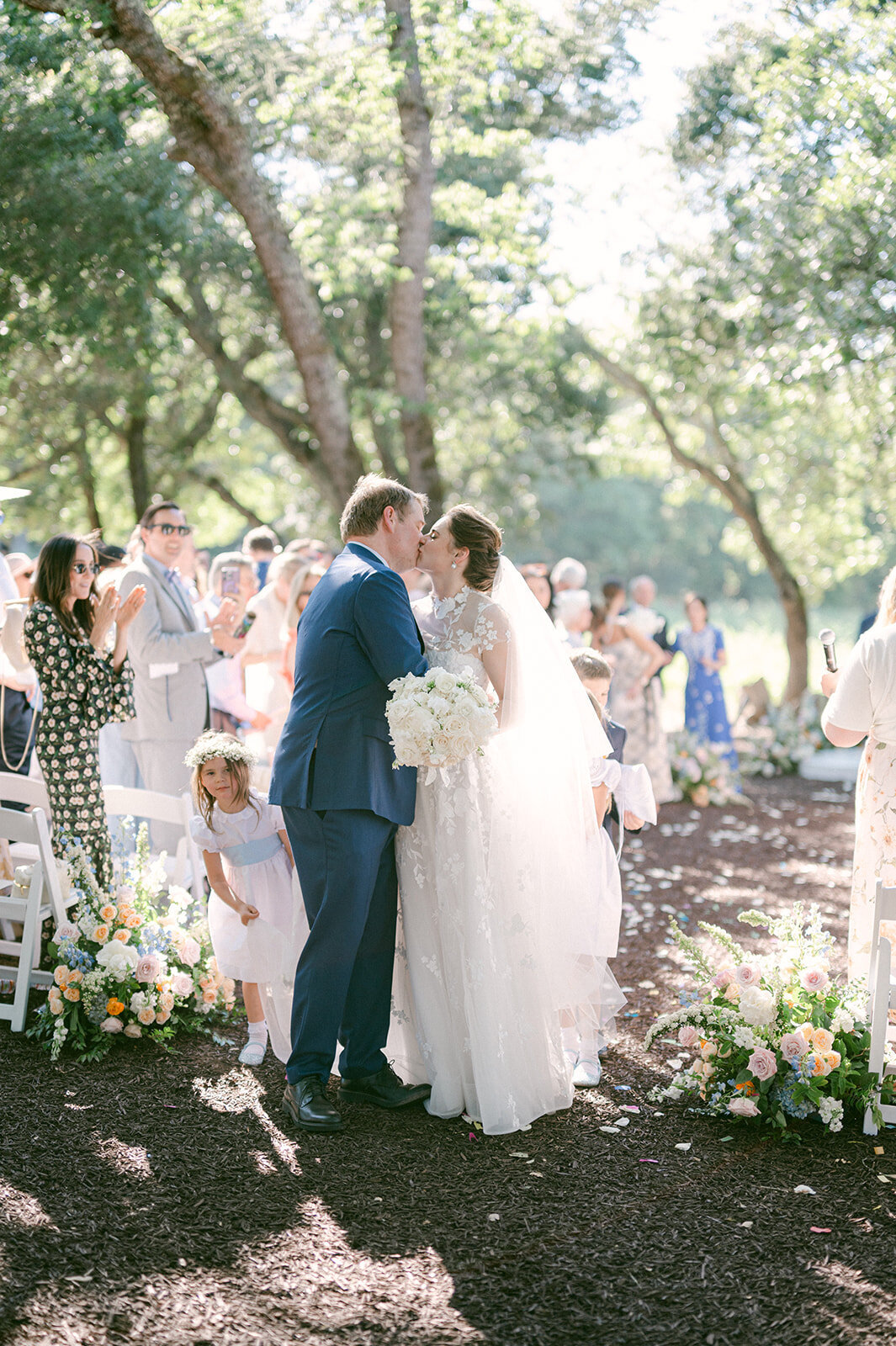 Bride and Groom kiss at the end of their wedding ceremony in Napa Valley.