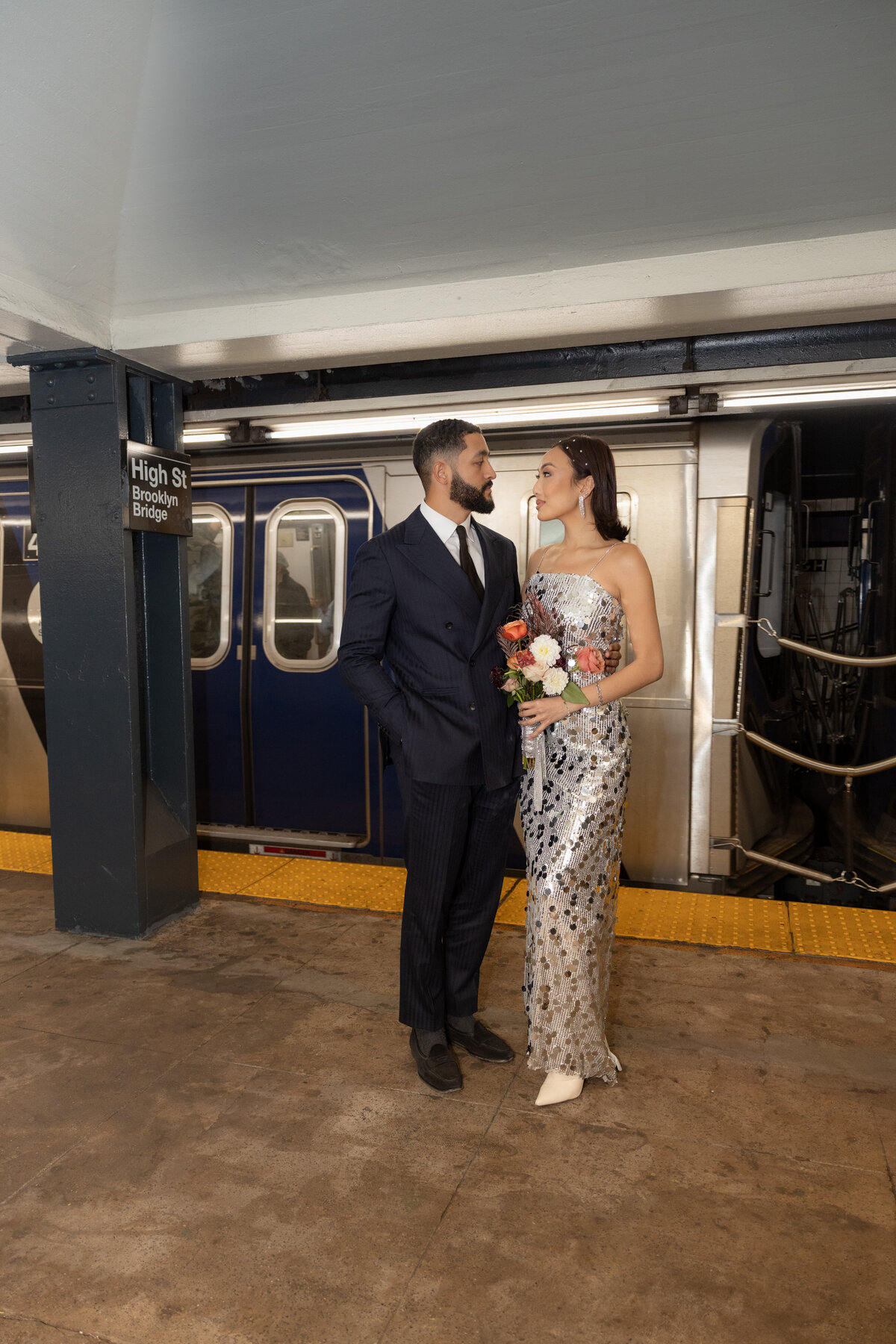 Modern, urban editorial elopement session on the NYC subway, capturing bold style and romantic vibes.