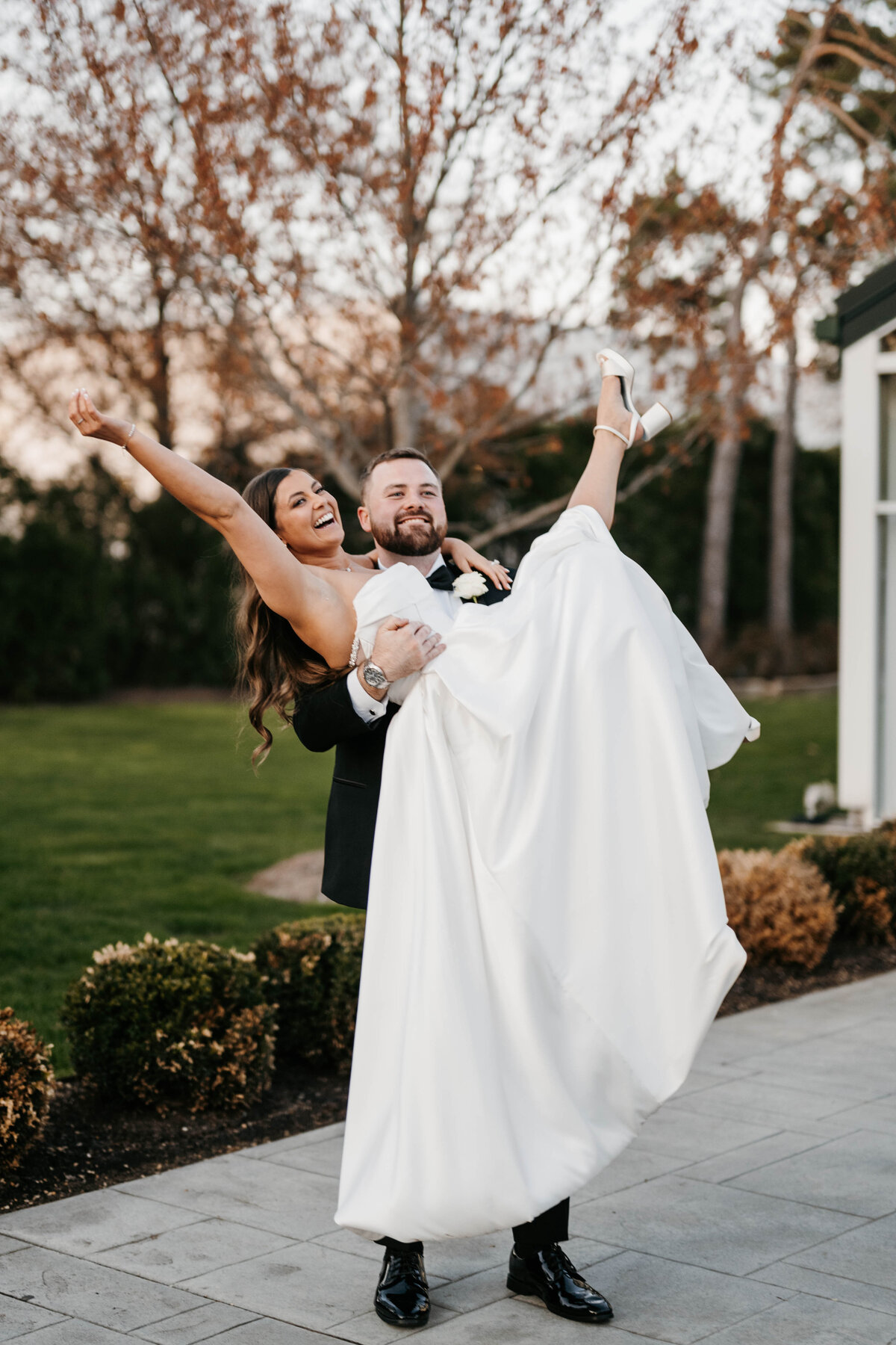 Groom holding the bride