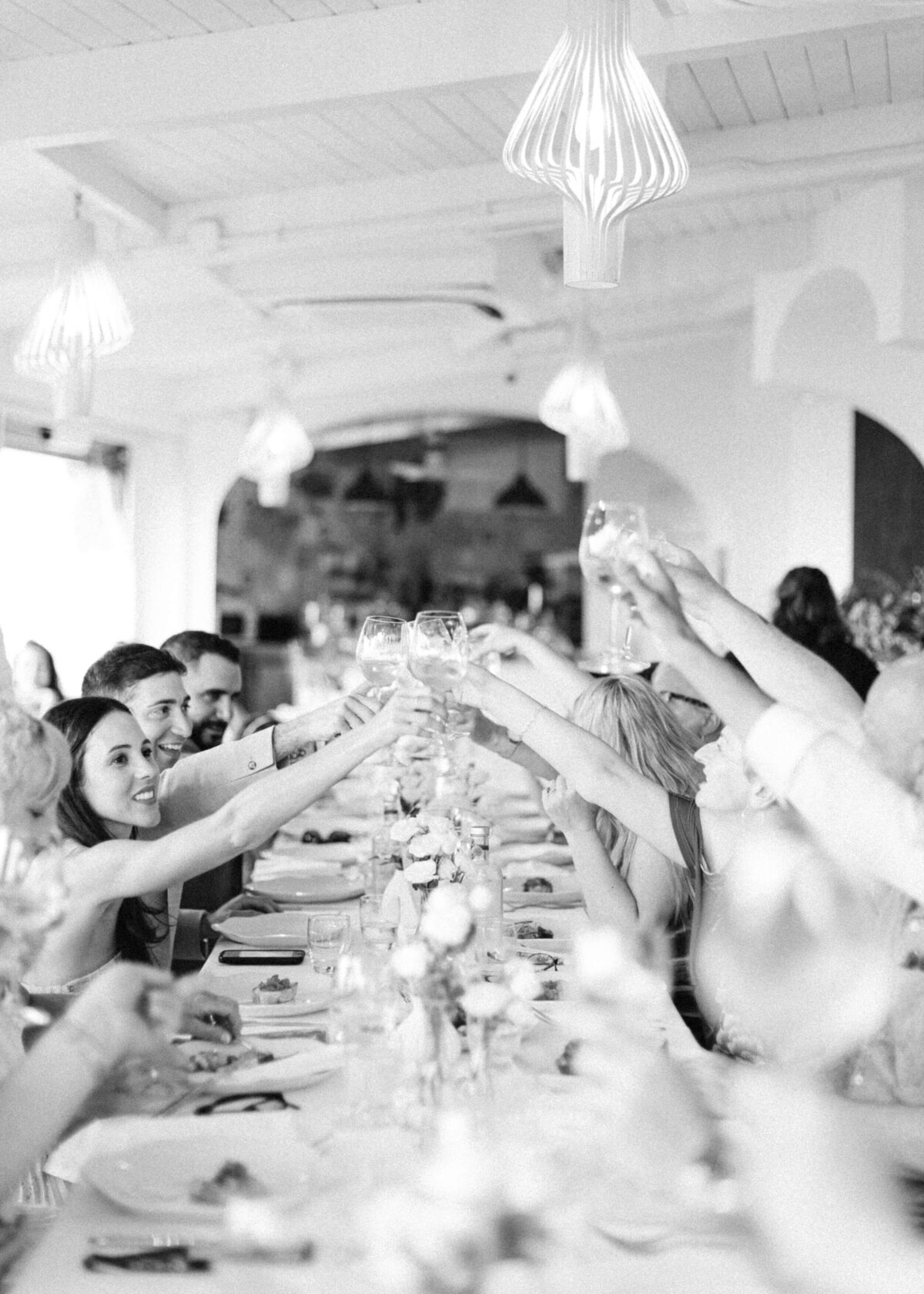 chloe-winstanley-italian-wedding-positano-welcome-dinner-toast