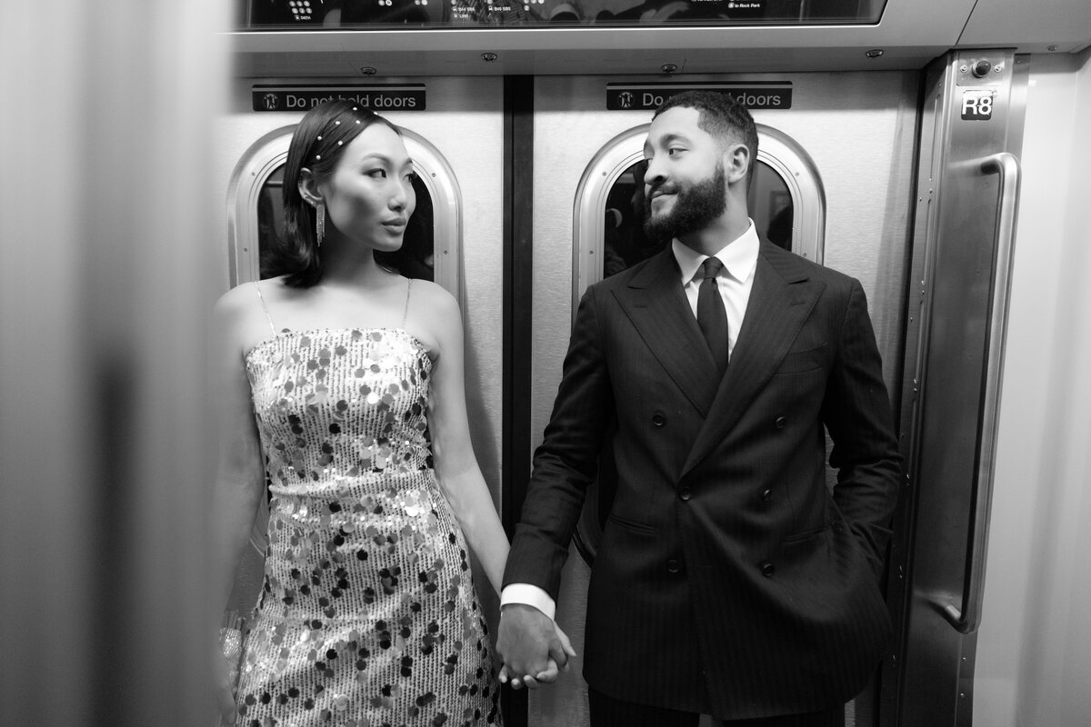 Modern, urban editorial elopement session on the NYC subway, capturing bold style and romantic vibes.
