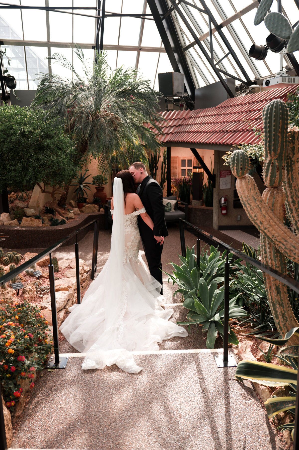 bride and groom kiss