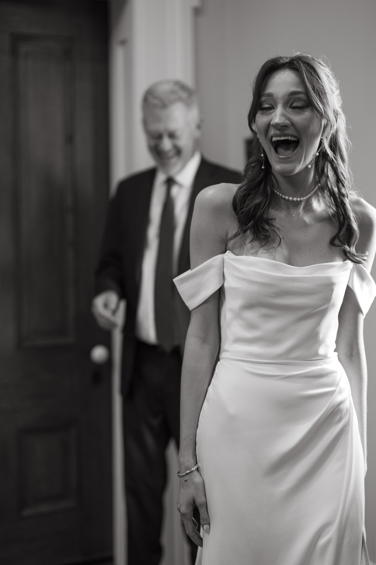bride surprises dad walking down stairs