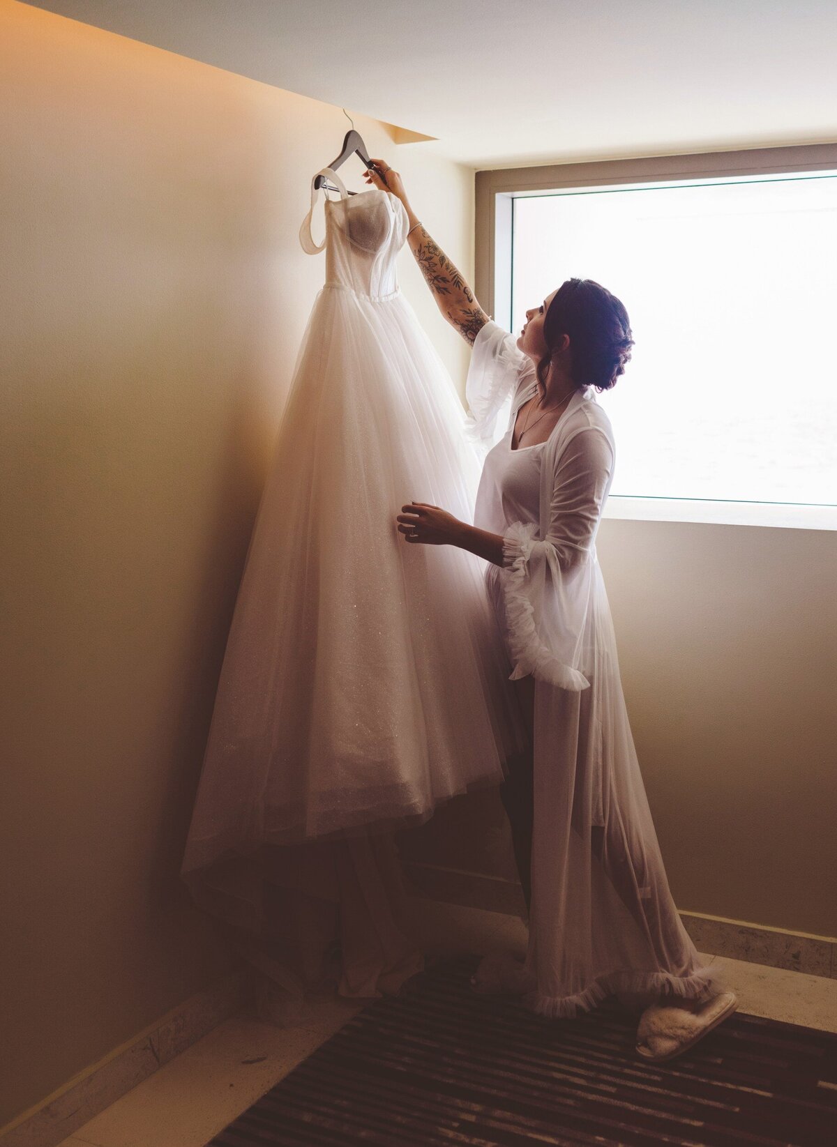 Bride getting dress at Cancun wedding