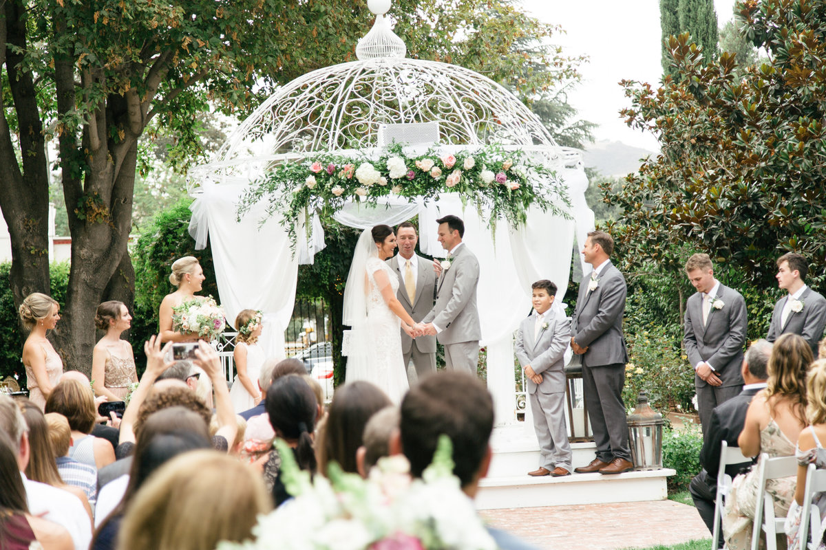 bride and groom at altar at 1880 Union Hotel Wedding