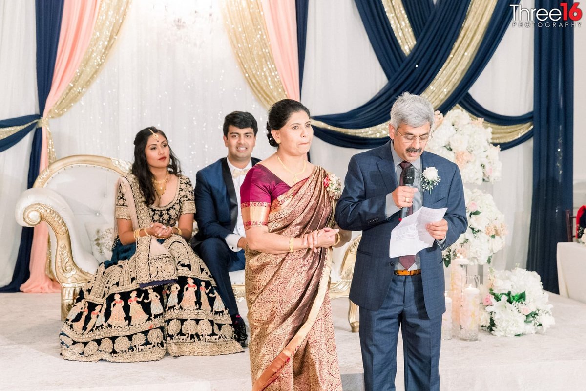 Parents give toast at a Hilton Waterfront Beach Resort wedding reception