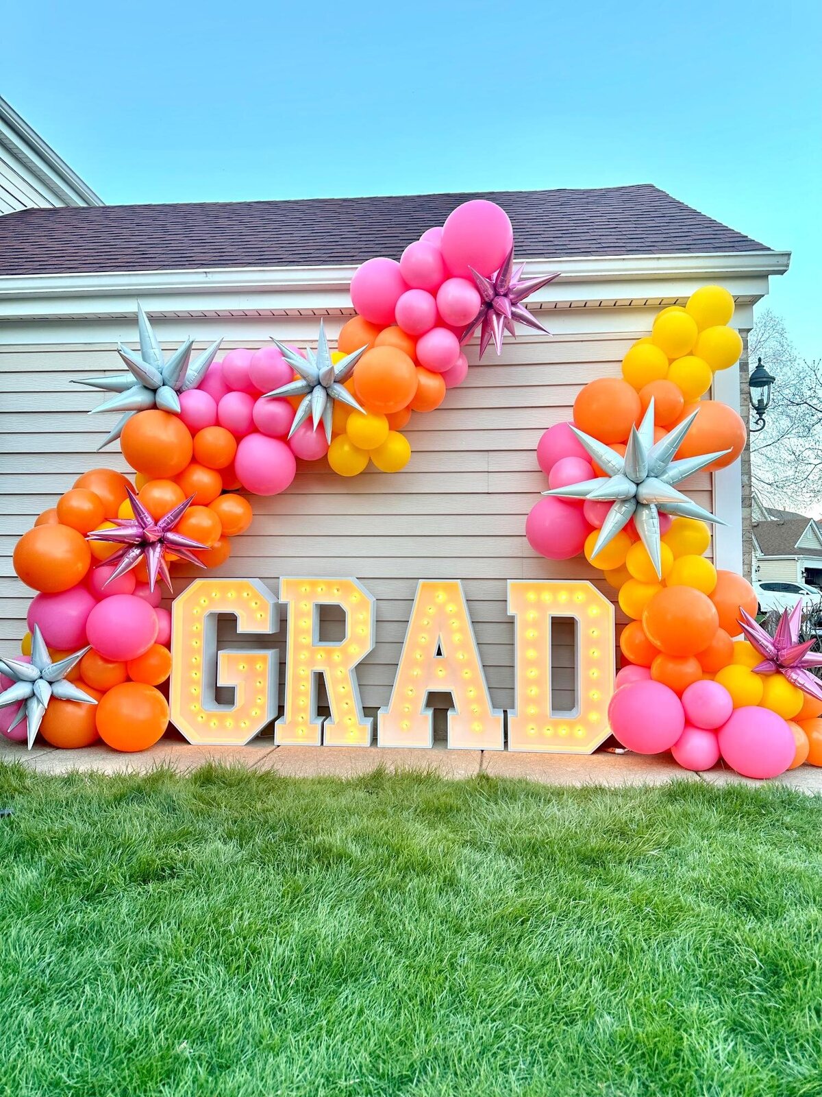 graduation balloons and letters 
