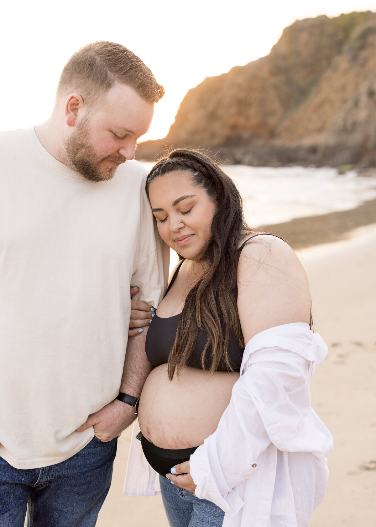 romantic maternity photo on the beach