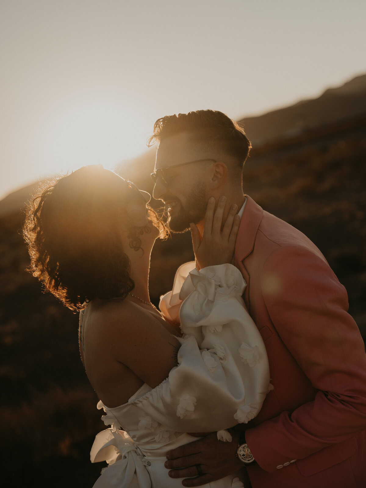 Bride and Groom in front of Seven Magic Mountains in Las Vegas.