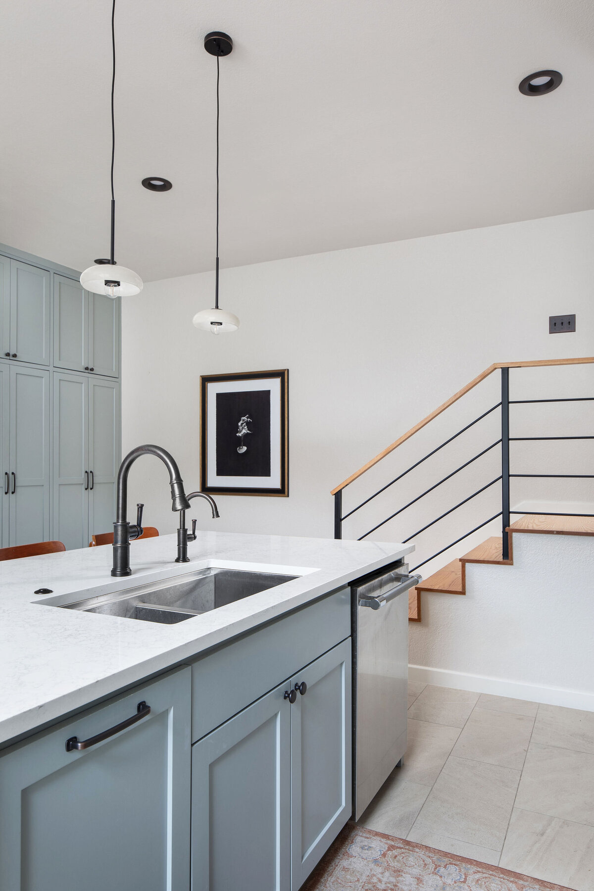 hello-home-modern-kitchen-island-blue-cabinets-minimalist-kitchen-with-staircase-8v2