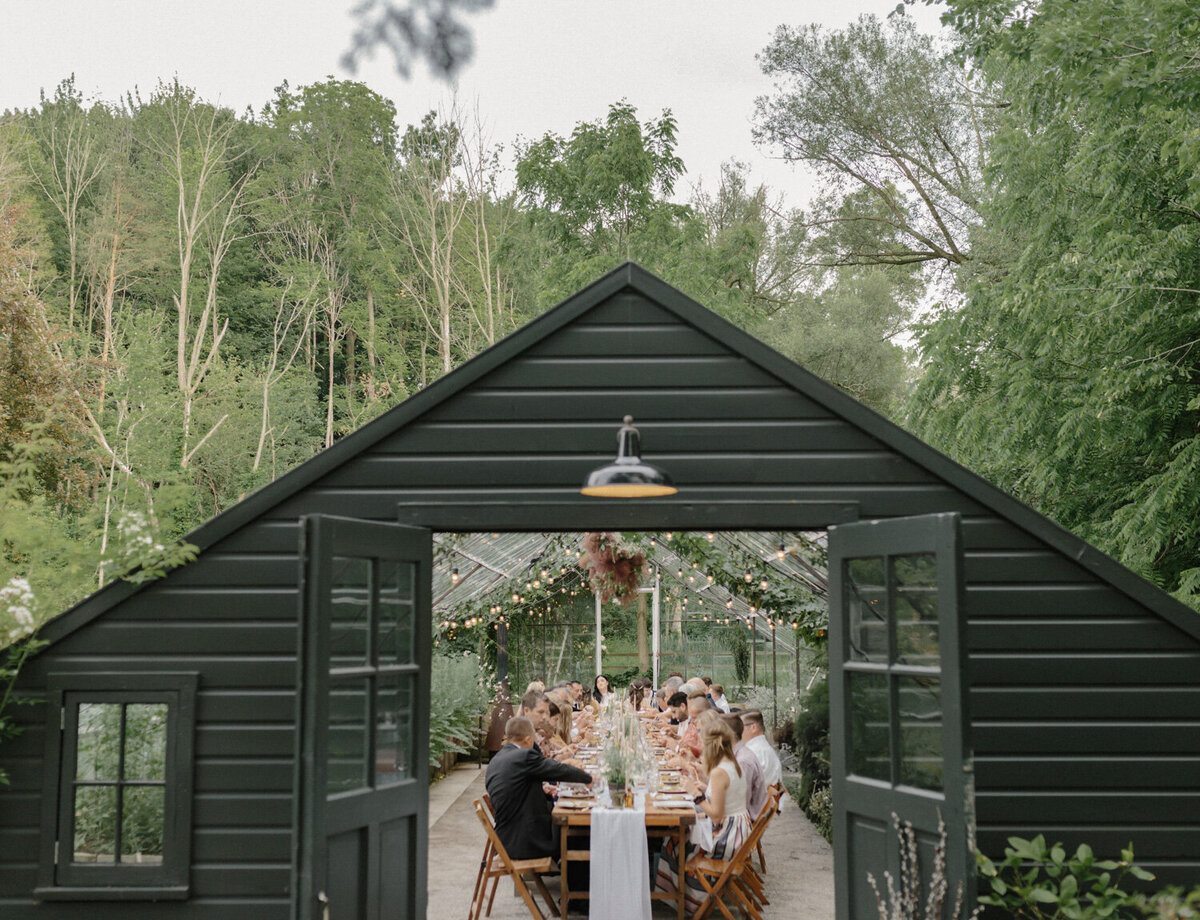 wedding dinner in greenhouse, Glass House Wedding venue, Michigan