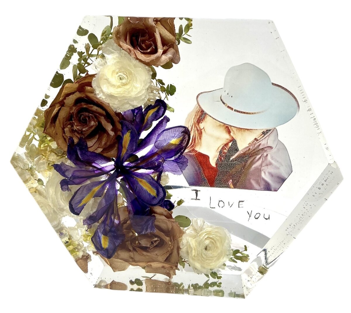hexagon resin block with brown cream and purple funeral flowers preserved alongside photo and loved ones hand writing as a timeless family keepsake
